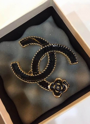 CHANEL brooches