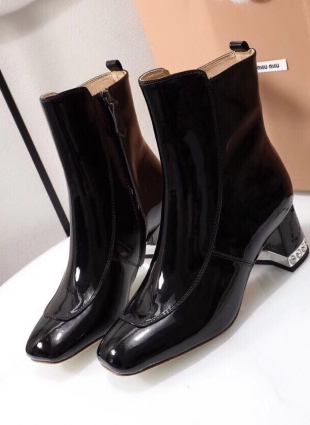Miu Miu patent leather black boots