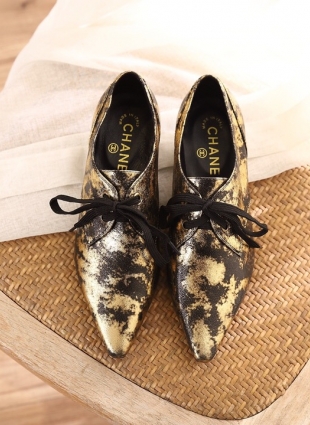 Chanel shoes black and gold