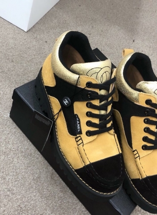 Chanel boots black and yellow
