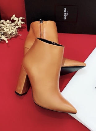 Yves Saint Laurent boots gold