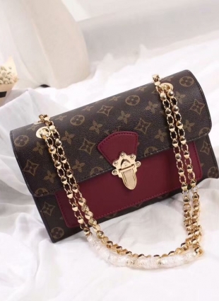 LOUIS VUITTON VICTOIRE BAG