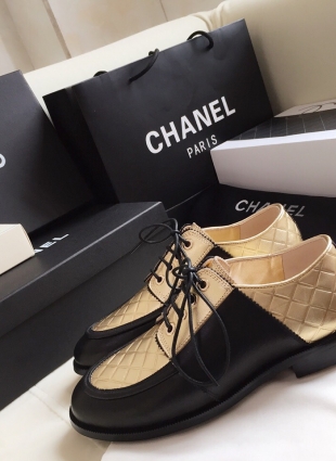 Chanel shoes black and gold