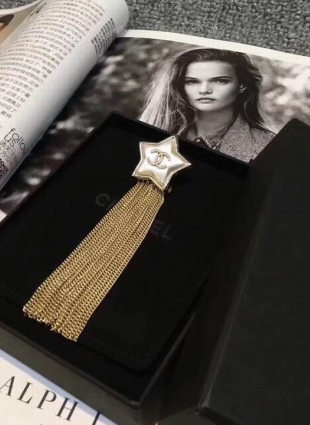 CHANEL brooches gold star
