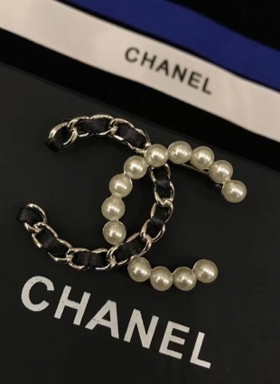 CHANEL brooches