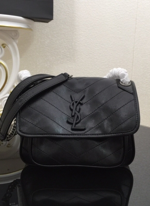 Yves Saint Laurent black bag with old silver chain