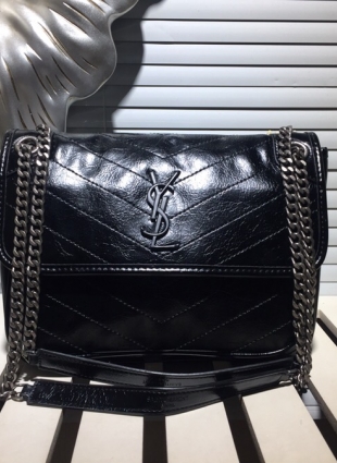 Yves Saint Laurent black bag with silver chain