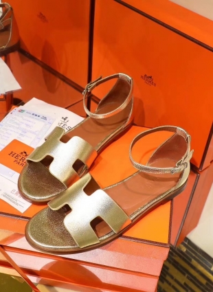 Hermès sandals gold