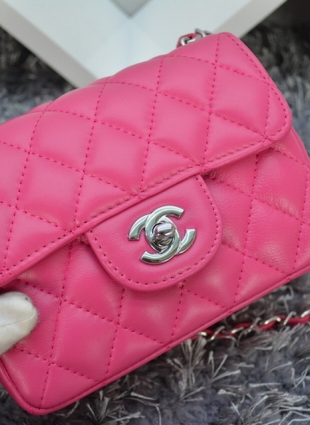 CHANEL pink bag silver chain stitched edge