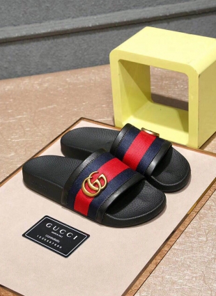 Gucci slippers with GG