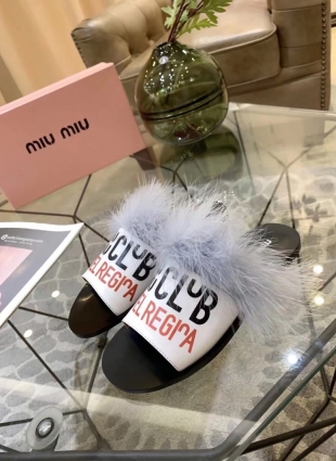 Miu Miu step-ins white and blue