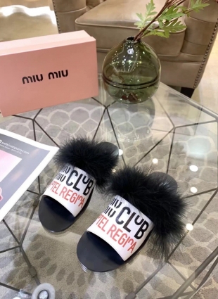 Miu Miu step-ins white and black