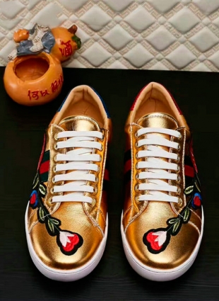 Gold Gucci Ace Sneakers