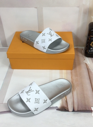 Louis Vuitton slides white and silver