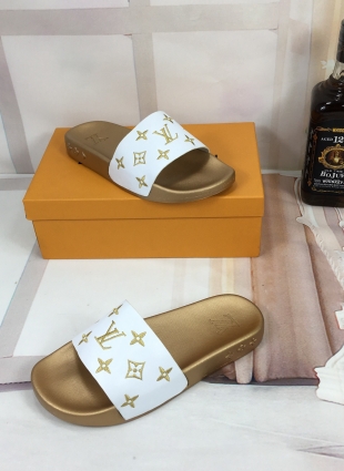 Louis Vuitton slides white and gold