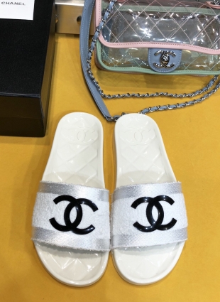 Chanel slides white