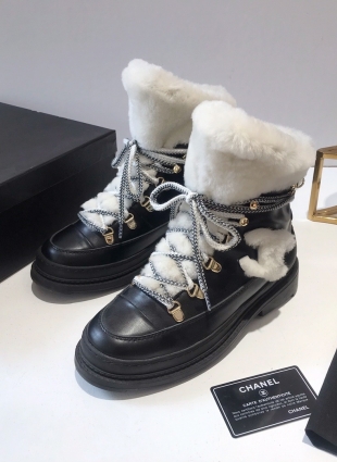 Chanel boots black and white