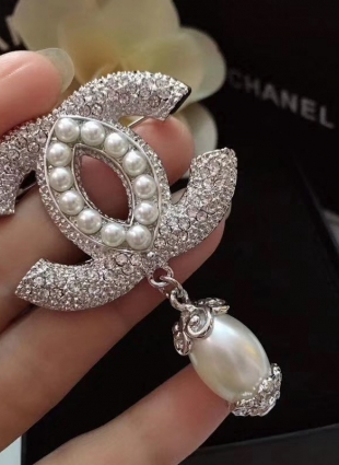 CHANEL brooches