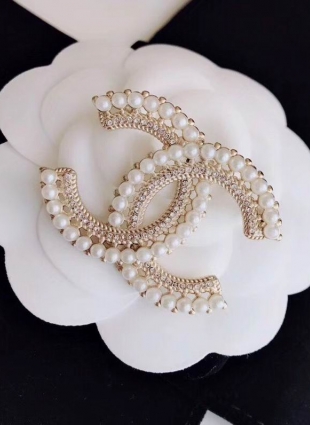 CHANEL brooches