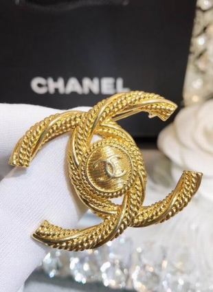 CHANEL brooches